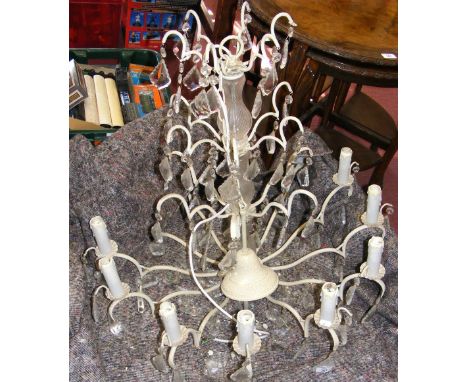 A decorative crystal drop chandelier