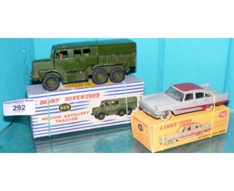 A Dinky Supertoys No.689 Medium Artillery Tractor, together with a Dinky Toys No.192 Sedan - both boxed