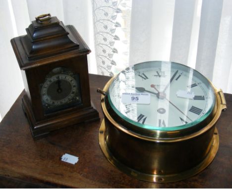 A Smiths brass cased bulkhead clock - 17cm diameter, together with a small bracket style clock