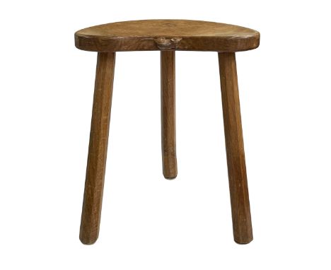 Robert Thompson of Kilburn 'Mouseman' kidney shaped milking stool, 45.5cm by 36.5cm by 29cm.