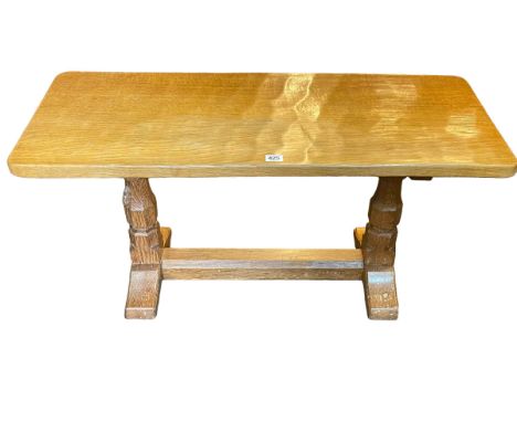 Robert Thompson of Kilburn 'Mouseman' adzed oak refectory coffee table, 44.5cm by 91cm by 36.5cm.