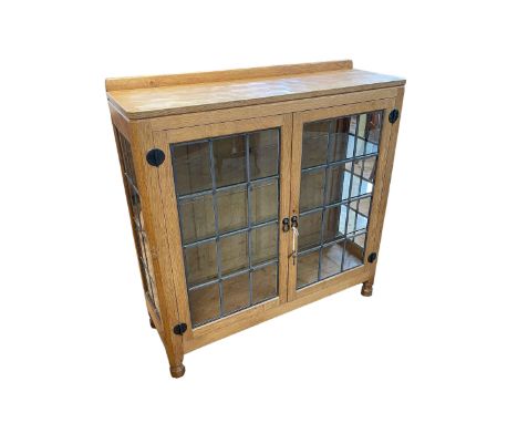 Robert Thompson of Kilburn 'Mouseman' adzed oak double leaded glazed door display cabinet, 100cm by 106.5cm by 36cm.