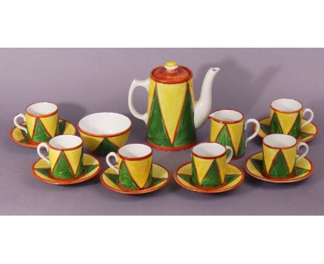 A Clarice Cliff Original Bizarre 14-piece coffee set (settings for six) with painted overlapping triangles in yellow &amp; gr