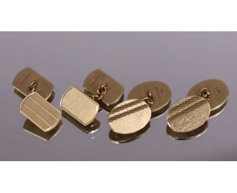 A pair of 9ct. gold cuff-links with oval engine-turned panels; &amp; another pair with rectangular panels. (22.2gm total).