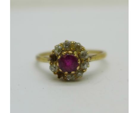 A yellow metal, diamond and ruby ring, two stones missing, 2.0g, M 