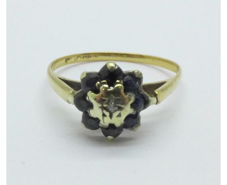 A 9ct gold sapphire and diamond cluster ring, 1.3g, I 