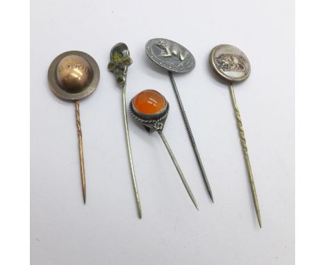 Five stick pins including Memorable Order of Tin Hats stickpins 