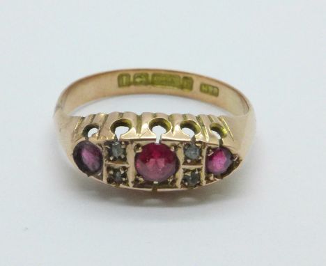 An 9ct gold ruby and diamond ring, Birmingham 1910, 1.8g, N 