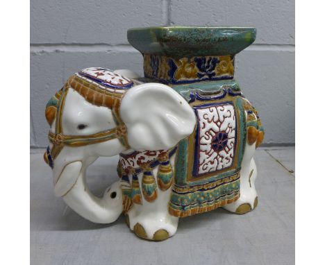 A ceramic elephant seat&nbsp;**PLEASE NOTE THIS LOT IS NOT ELIGIBLE FOR POSTING AND PACKING**