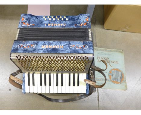 A Hohner Carmen I piano accordion with instruction manual&nbsp;&nbsp;**PLEASE NOTE THIS LOT IS NOT ELIGIBLE FOR POSTING AND P
