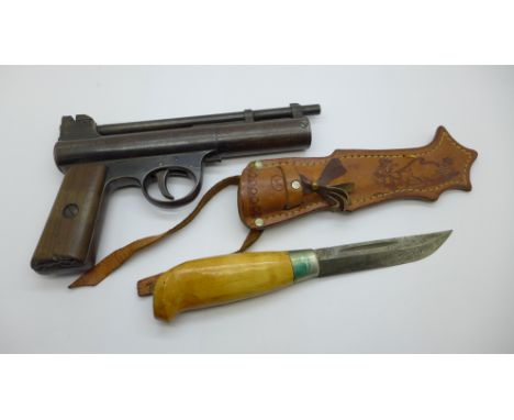 A Webley Air Pistol Mark I., .177 and a dagger with scabbard, the blade marked Jutland 