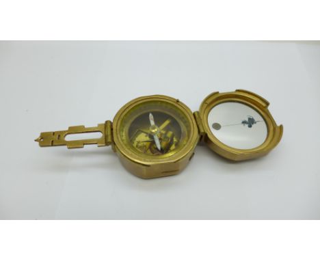 A reproduction Stanley London brass compass 