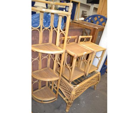 A matched set of bamboo and rattan conservatory furniture comprising four tier corner shelf, two side tables and a glass topp