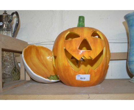 A pottery jack-o-lantern and a matching bowl