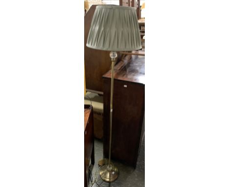 A floorstanding lamp with shade 