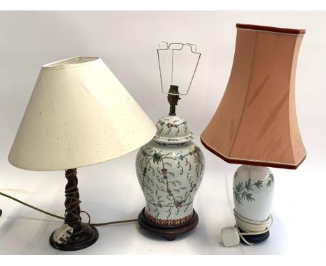 Two baluster ceramic table lamps, an oak barley twist table lamp and one other 