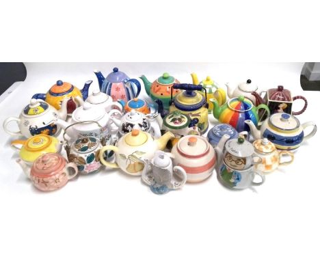 A mixed lot of teapots, some novelty, to include one Russian in the form of an eagle, Arthur Wood, Sadler, Grays pottery etc 