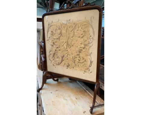 A glazed embroidered fire screen, 55cmW 