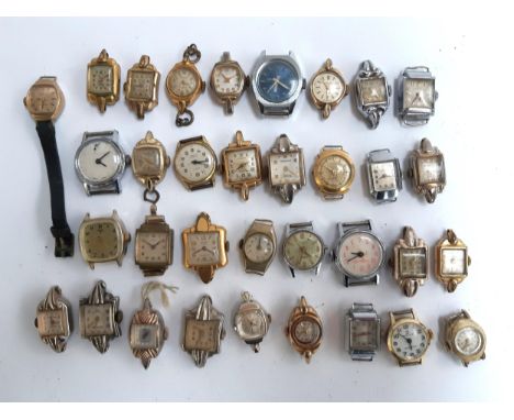 A collection of 34 wrist watches without straps to include Regency, Renova, Timex, Dulux, Mustang, Tenor, Gesa, Ivy etc 