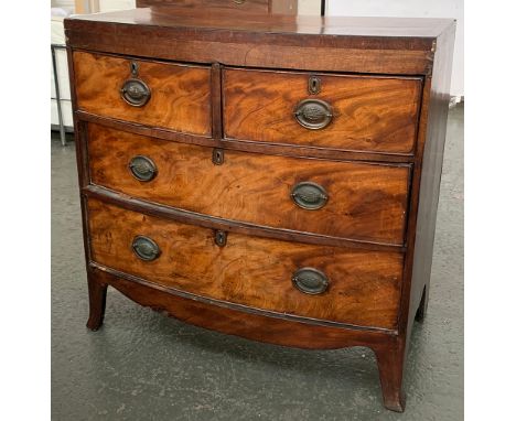 A Regency mahogany and crossbanded small bowfronted chest, of two short over two long drawers, on swept bracket feet, in need