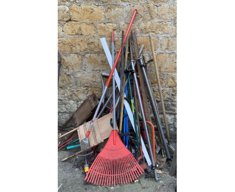 A very large quantity of long handled garden tools 