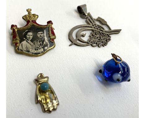 A small lot to include a WWII gilt metal and enamel photographic badge commemorating the 1938 wedding of King Farouk and Quee