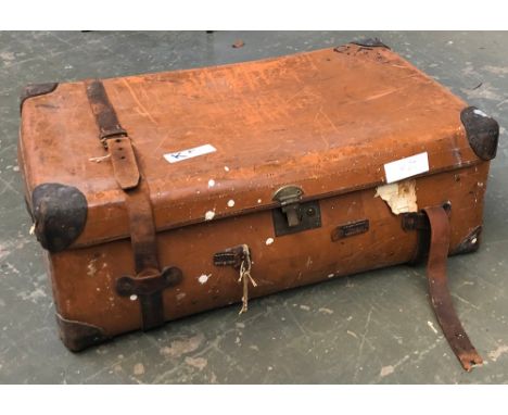 A vintage leather travel trunk, with leather corner bracings, 85x55x30cm 