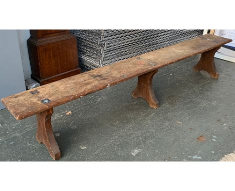 An early 20th century long oak bench, 230x30x40cmH 
