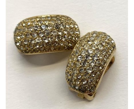 A pair of vintage Christian Dior clip on earrings, gold tone and paste half hoop design, stamped, each 2cmL 