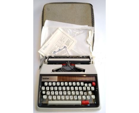 A Brother deluxe 1350 portable typewriter in case 