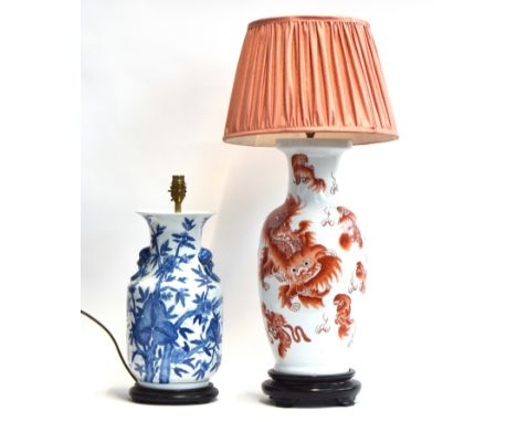 A modern Chinese blue and white lamp base; and an iron red on white modern Chinese lamp base (2) 