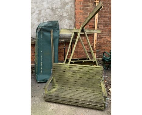 A teak garden swing seat, retailed by Pepe, Worcester, in need of some repair, width of bench 127cm 