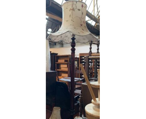A stained wood standard lamp, with embroidered shade, 170cmH 
