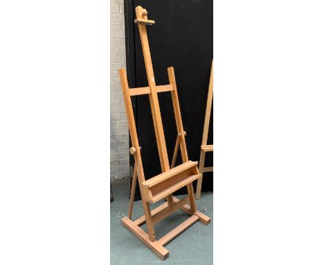 A beechwood floorstanding artist's easel, height when folded 195cmH 