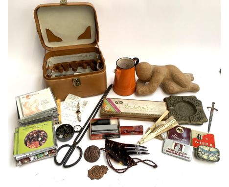 A mixed lot to include rolled gold rotary ladies wristwatch, letter opener, tins, wooden figure, enamel jug, Mongolian tongs,