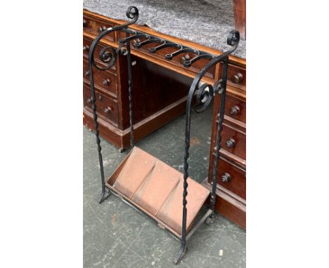 A 19th century wrought iron and copper stick stand, with drip tray, Rd. no. 473759, 45cmW 