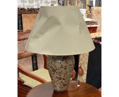 A ceramic table lamp with floral design, 63cmH to top of shade 