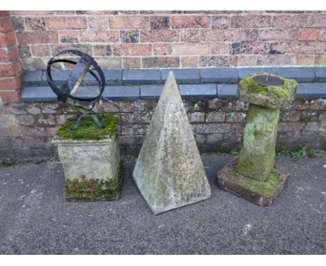 AN ARMILLARY SUNDIAL ON A WEATHERED BASE73cm high (needs re-fixing), another sundial with cast metal dial, on a cast base, an