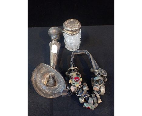 A SILVER-TOPPED JARa filled silver candlestick (a/f), and a quantity of Indian white metal rings
