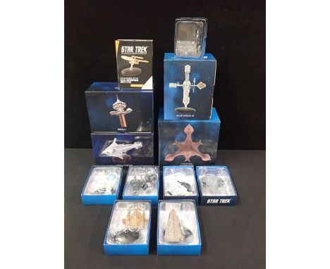 FOUR BOXED EAGLEMOSS HERO COLLECTOR 'STAR TREK' SPACE SHIP MODELSWith a Gold model of the U.S.S. Enterprise NCC-1701 and seve