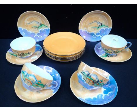 A JAPANESE EGGSHELL PORCELAIN PART TEA SETdecorated with views of Fuji, with Noritake side plates