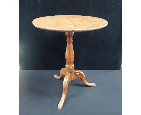 A 19th CENTURY  COUNTRY OAK TRIPOD TABLEwith turned stem and tilt top 63cm high, 55cm dia approc