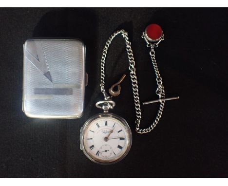 A SILVER POCKET WATCHtogether with silver albert chain with carnelian fob and silver cigarette case.