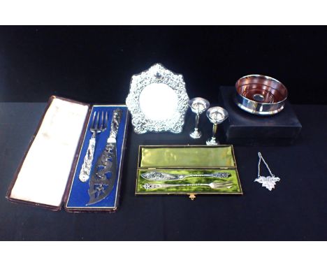 A SILVER PHOTO FRAMEwith a pair of small Silver vases (9.5cm high), a boxed Silver plated coaster and two boxed knife and for