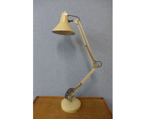 A cream metal anglepoise desk lamp 