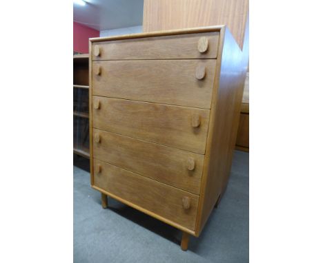 A light oak chest of drawers 