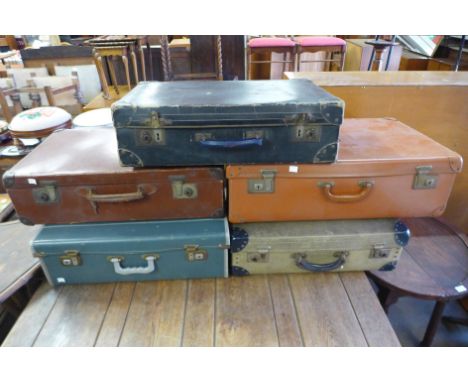 Five vintage suitcases 
