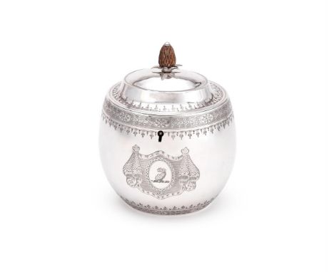 A GEORGE III SILVER OVAL TEA CADDY THOMAS HAYTER, LONDON 1805 With a wooden pineapple finial to the domed cover, engraved wit