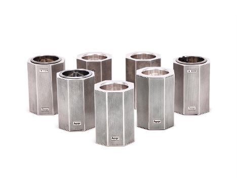 A SET OF SEVEN MATCHED SILVER OCTAGONAL CANDLE HOLDERS ASPREY & CO. LTD., BIRMINGHAM 1990 (2), 1991 (2), 1992 (2) AND 1993 (1
