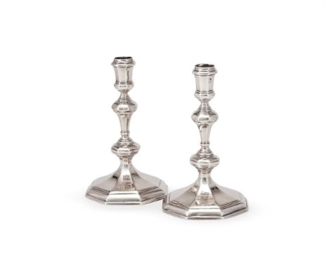 A PAIR OF QUEEN ANNE SILVER OCTAGONAL CANDLESTICKS THOMAS MERRY, LONDON 1709 With octagonal capitals, knopped stems, engraved